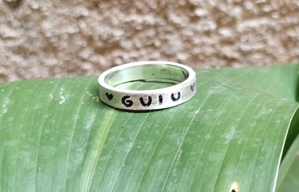 anell plata gravat nom