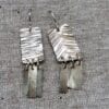 plata quadrats rectangles textura arracades ganxo