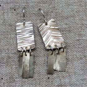 plata quadrats rectangles textura arracades ganxo